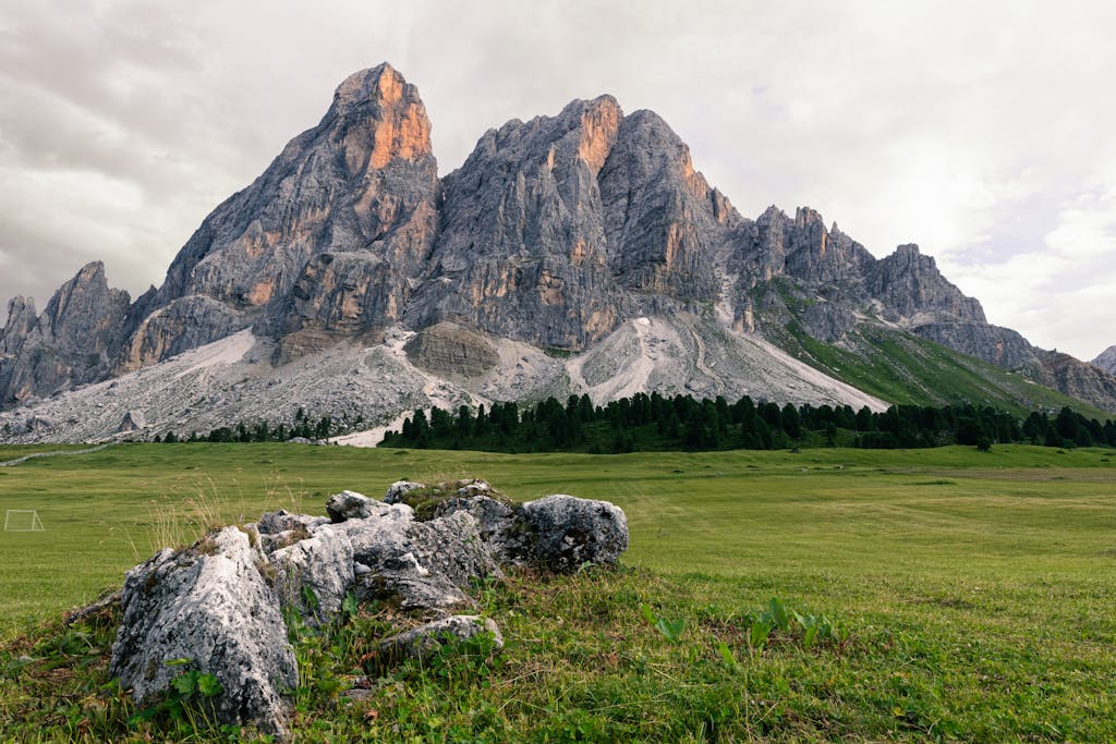 Majestic view of rugged Dolomites in summer evening light, perfect for travel inspiration.
